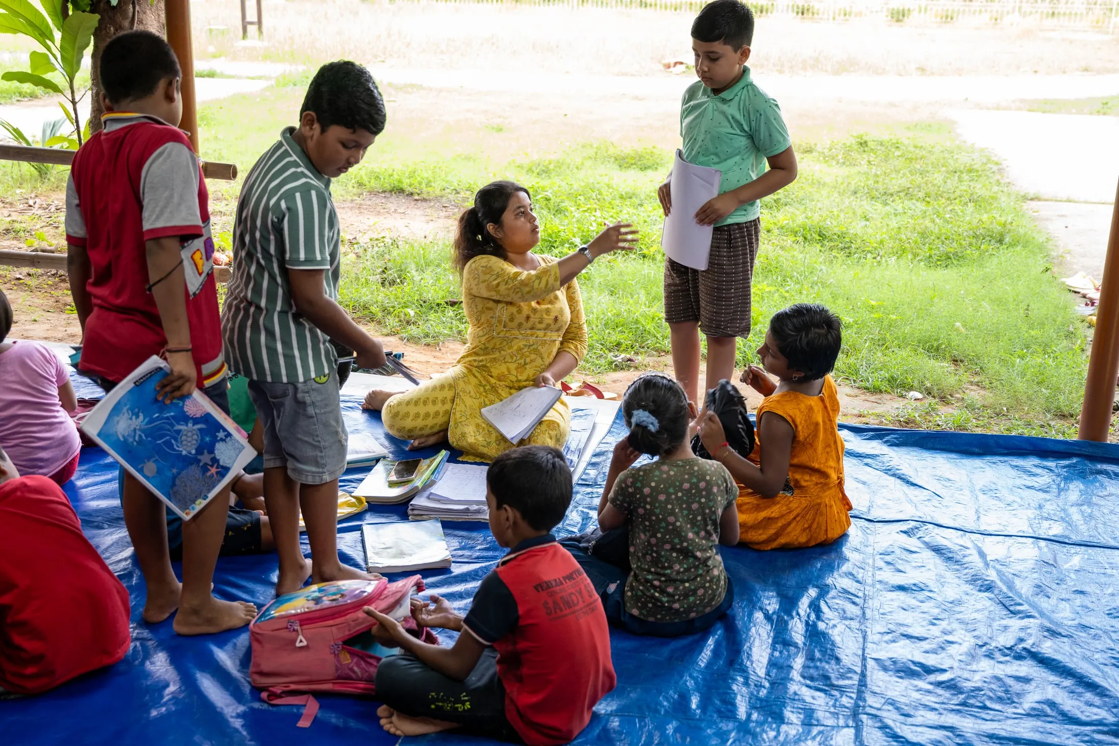A class being taken outdoors