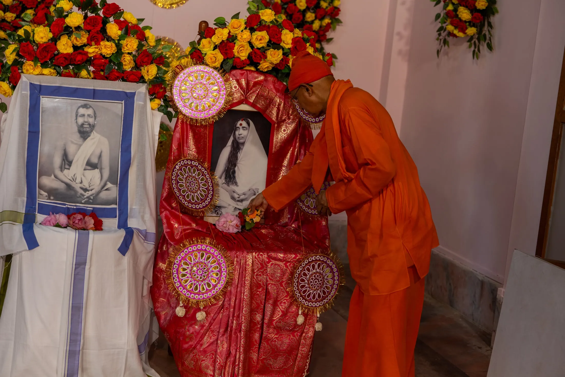 Flowers offered to the portrait of Holy Mother during Durga Puja