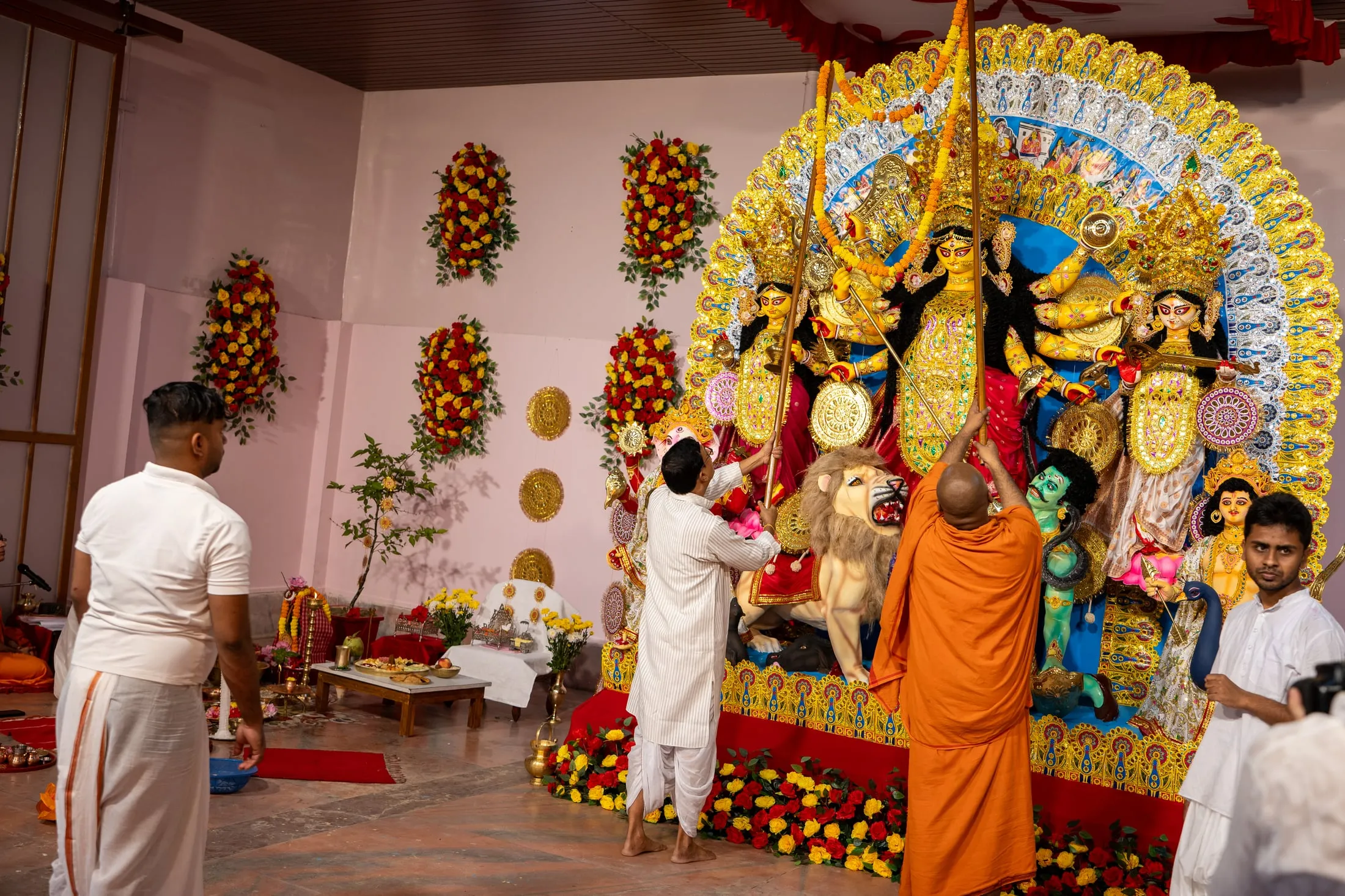 An offering made before the Durga pratima