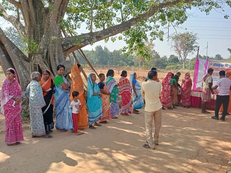 A queue at a village relief distribution