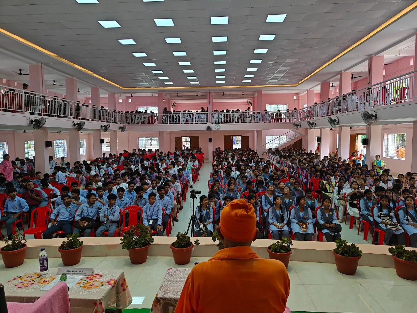 A monk addressing a youth convention from the stage